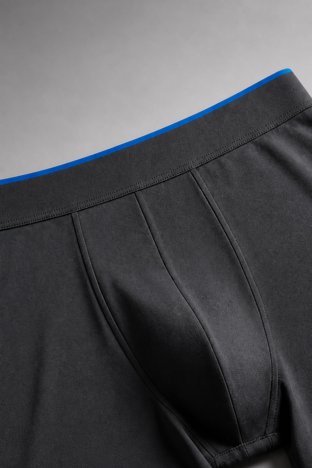 Close-up of charcoal seamless boxer brief waistband and construction