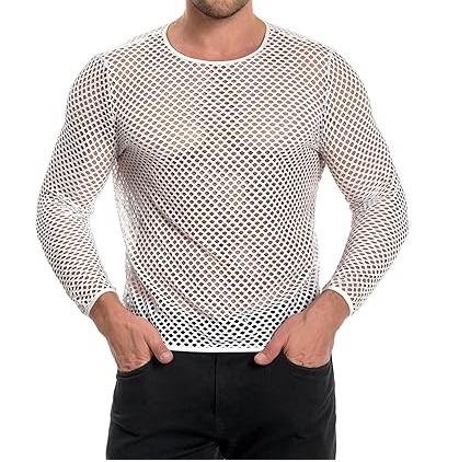 White fishnet long-sleeve top worn with black trousers